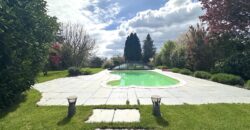 Charmante Maison Familiale avec Piscine et Vue Dégagée à Collex